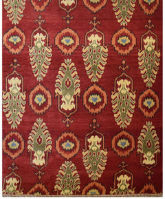 An Afghan Chobi runner rug featuring a repeating pattern of stylized motifs in red and green.