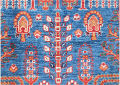 A handwoven Afghan Chobi runner featuring a traditional tree motif in red and blue wool.