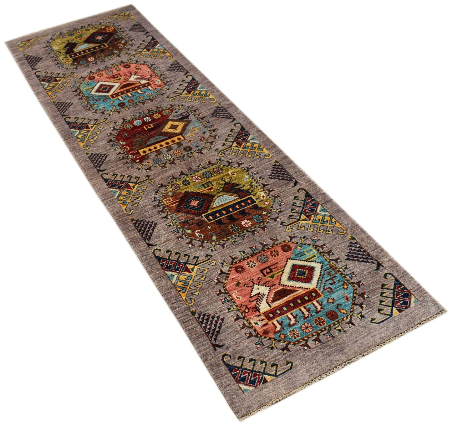 An Afghan Chobi runner rug featuring geometric medallions in earthy tones on a grey background.