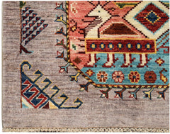 A hand-knotted Afghan Chobi runner featuring a geometric animal motif on a light grey background.