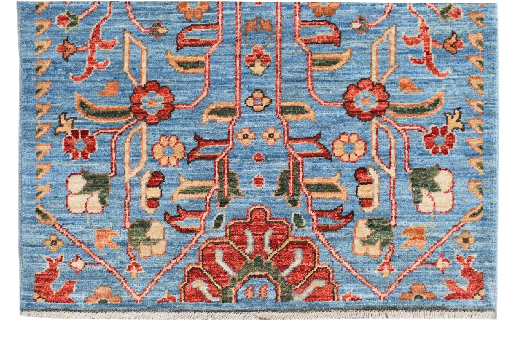 Handmade Afghan Chobi runner featuring a traditional floral pattern in red and blue tones.