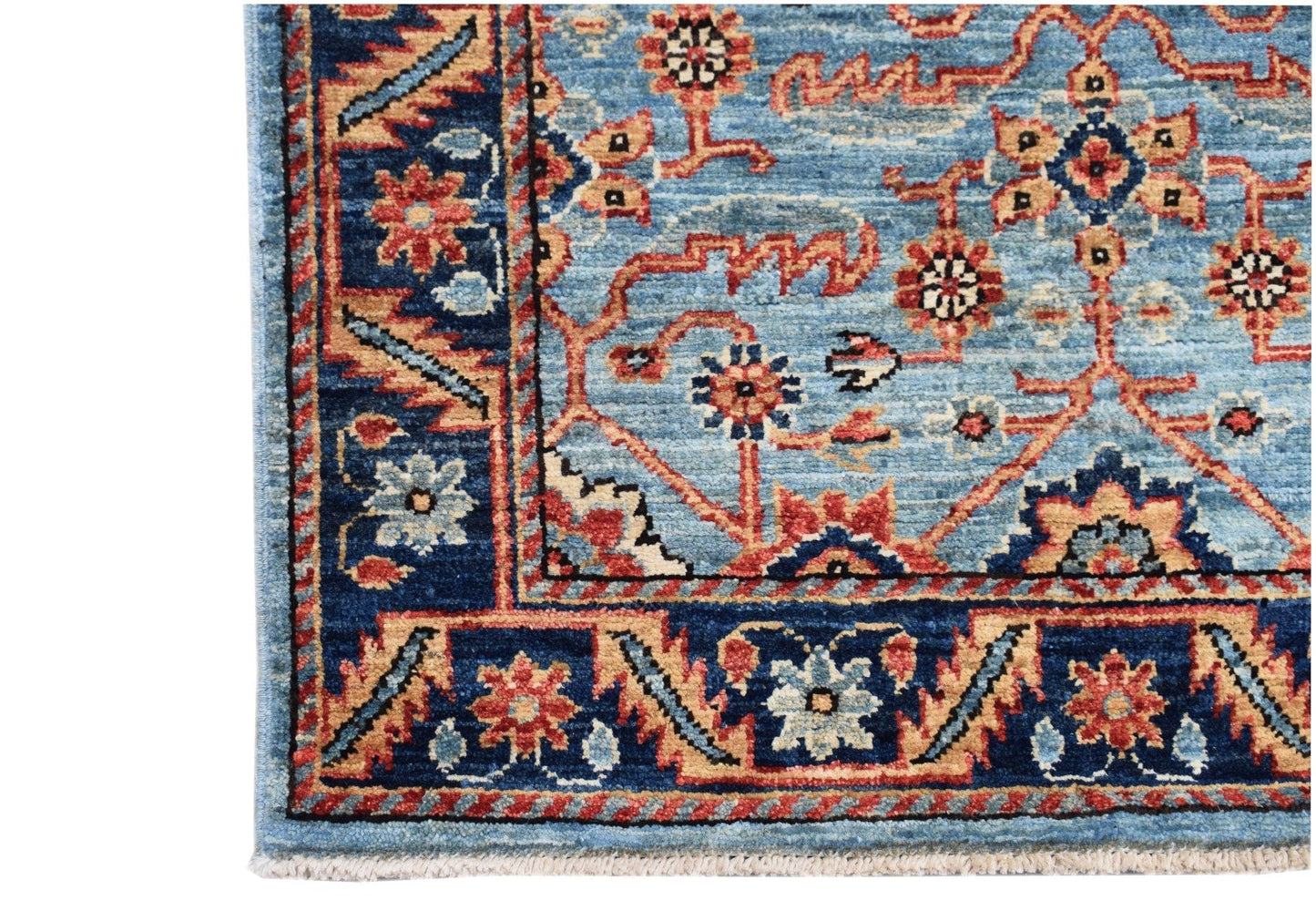 An Afghan Chobi runner featuring a traditional floral pattern in blue, red, and beige tones.