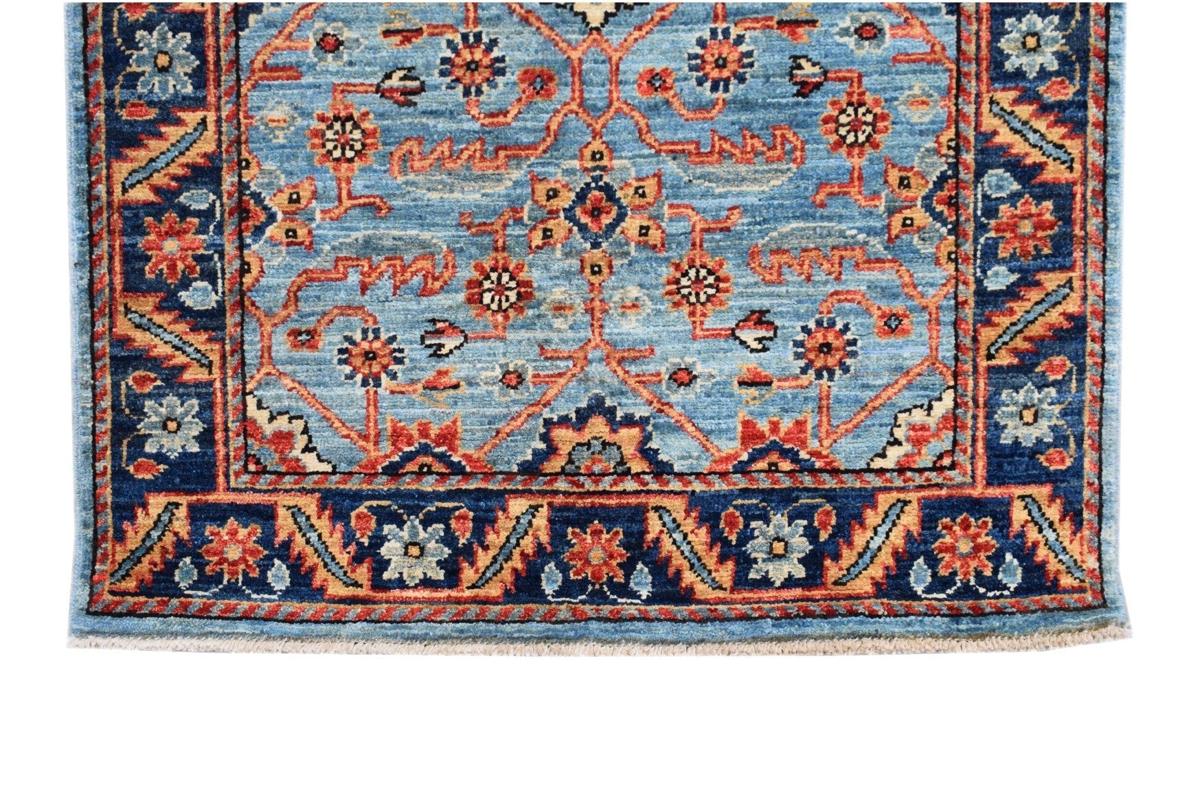 Handmade Afghan Chobi runner featuring a traditional floral pattern in blue, red, and tan tones.
