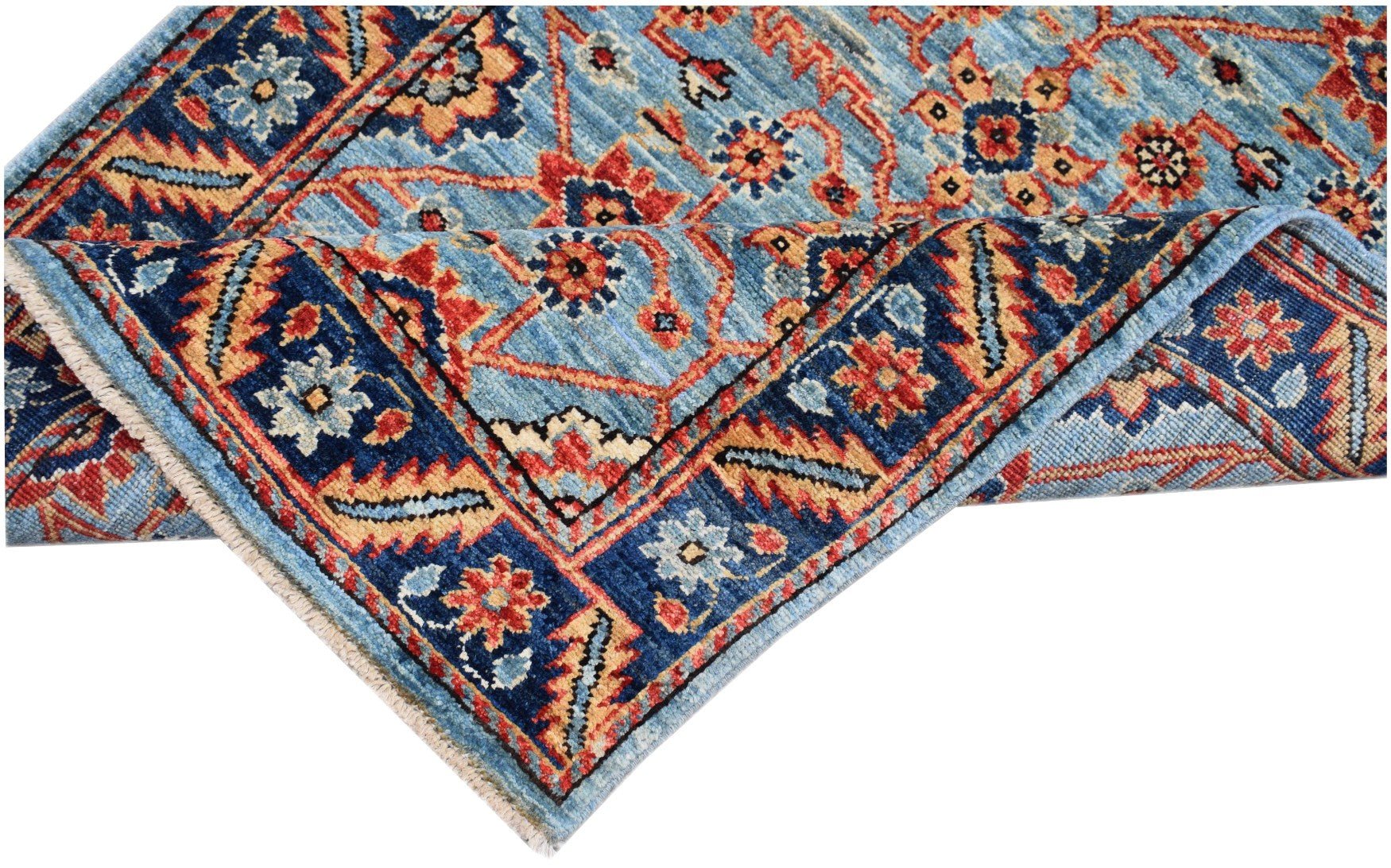 An Afghan Chobi runner featuring a traditional floral pattern in shades of blue, red, and tan.