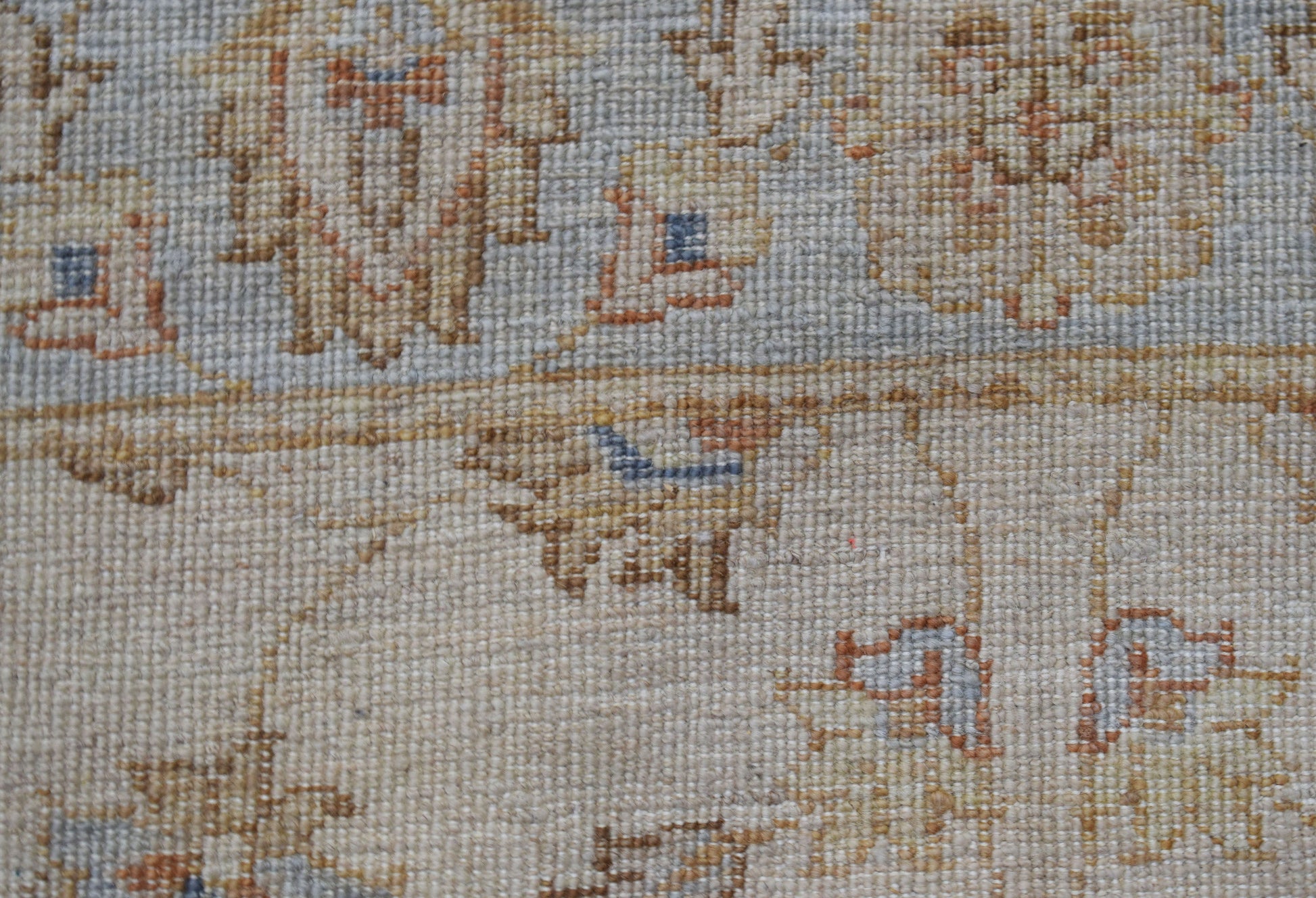 A close-up view of a handwoven Afghan Chobi runner featuring intricate traditional patterns.