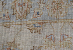 A close-up view of a handwoven Afghan Chobi runner featuring intricate traditional patterns.