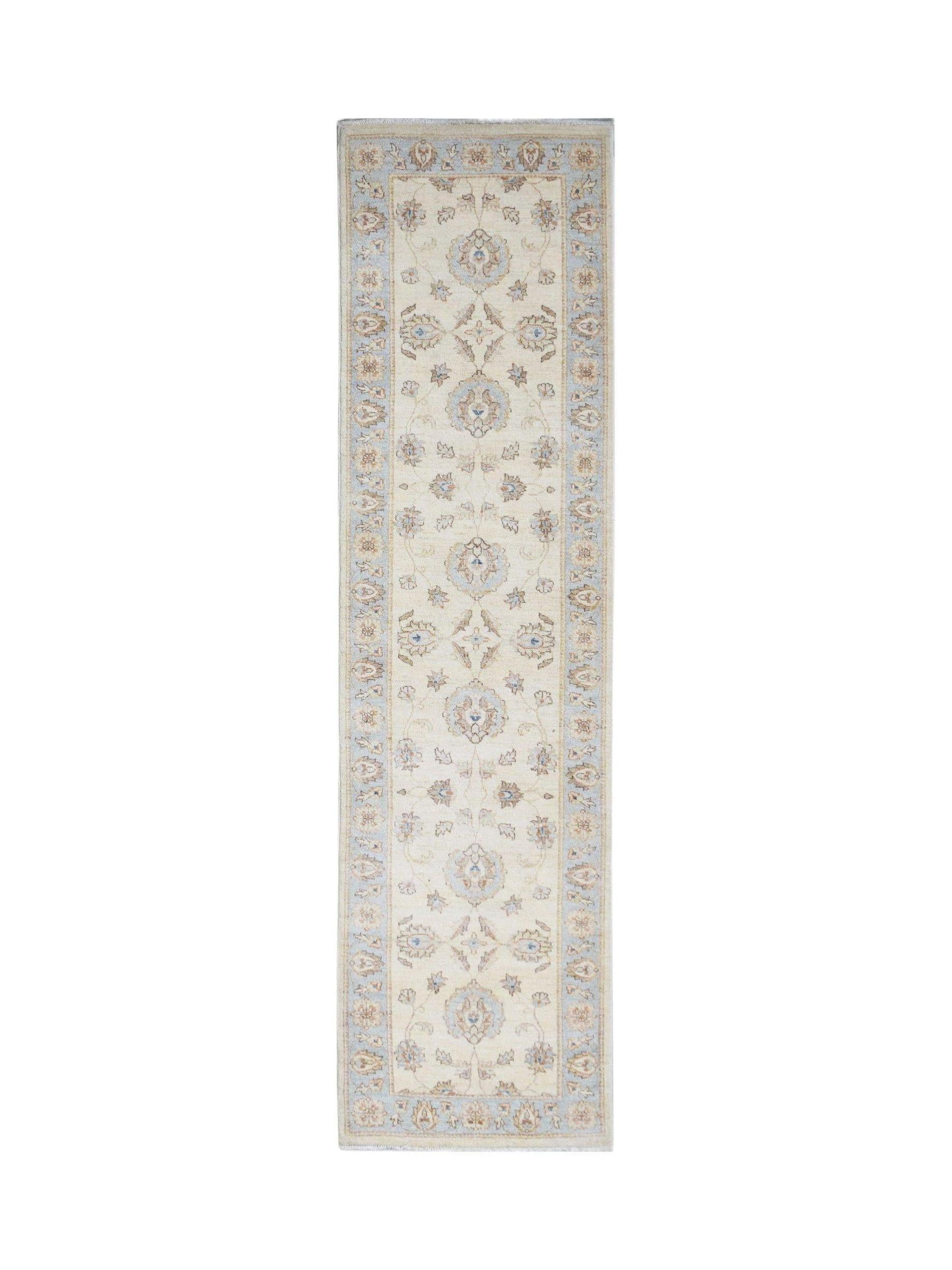 An Afghan Chobi runner rug featuring a traditional floral pattern in soft blue and beige tones.