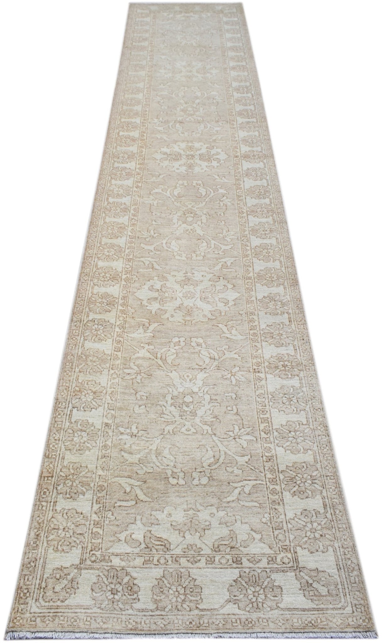 A long, handwoven Afghan Chobi runner rug featuring a traditional floral pattern in neutral tones.