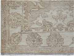 A handwoven Afghan Chobi runner featuring traditional floral patterns in neutral wood tones.