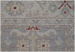 A close-up of an Afghan Chobi runner featuring intricate traditional patterns in muted earth tones.