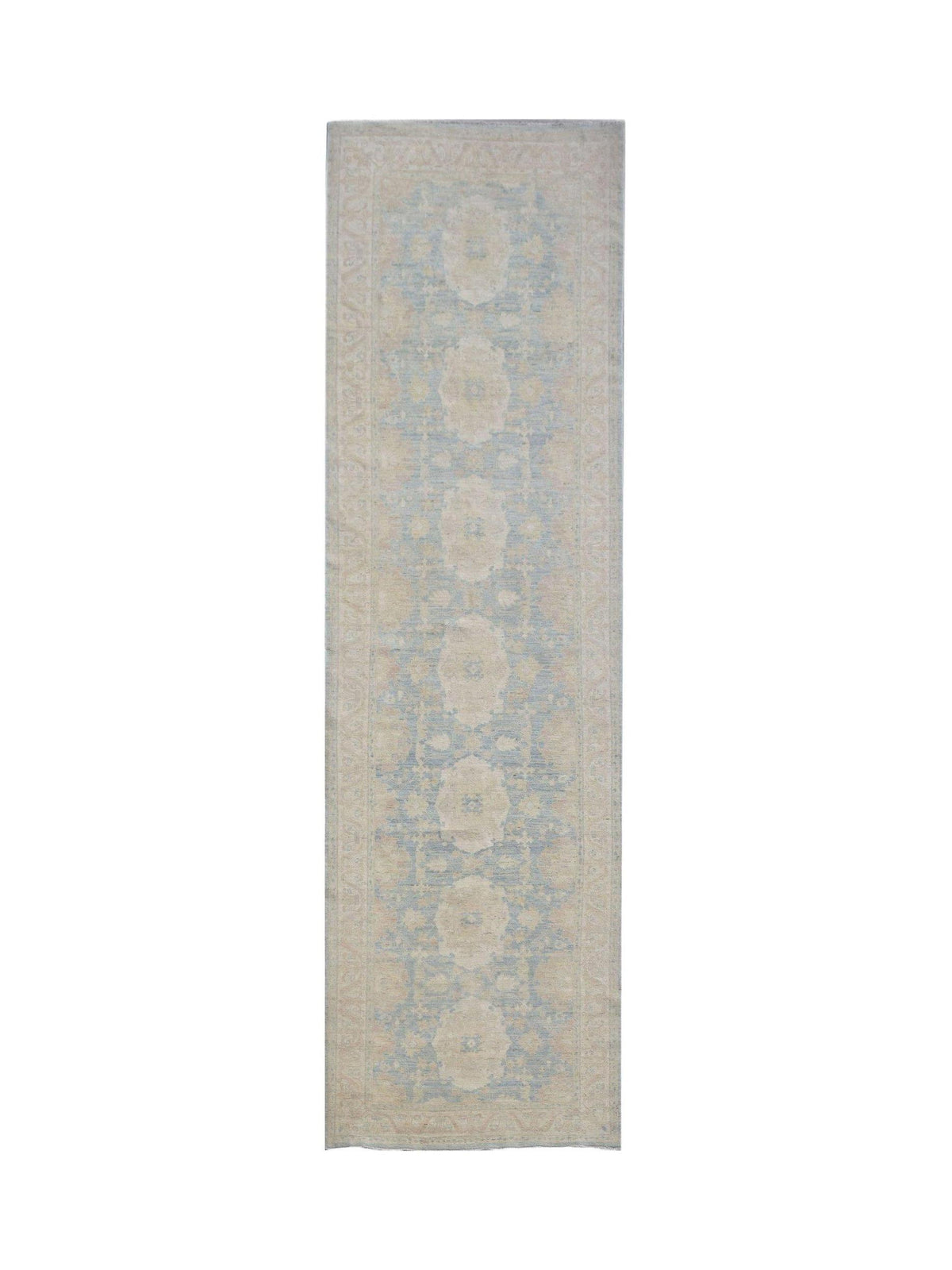 Handwoven Afghan Chobi runner rug featuring a traditional floral pattern in blue and beige tones.