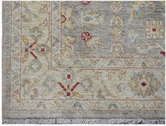 A handmade Afghan Chobi runner featuring a traditional floral pattern in soft, earthy tones.