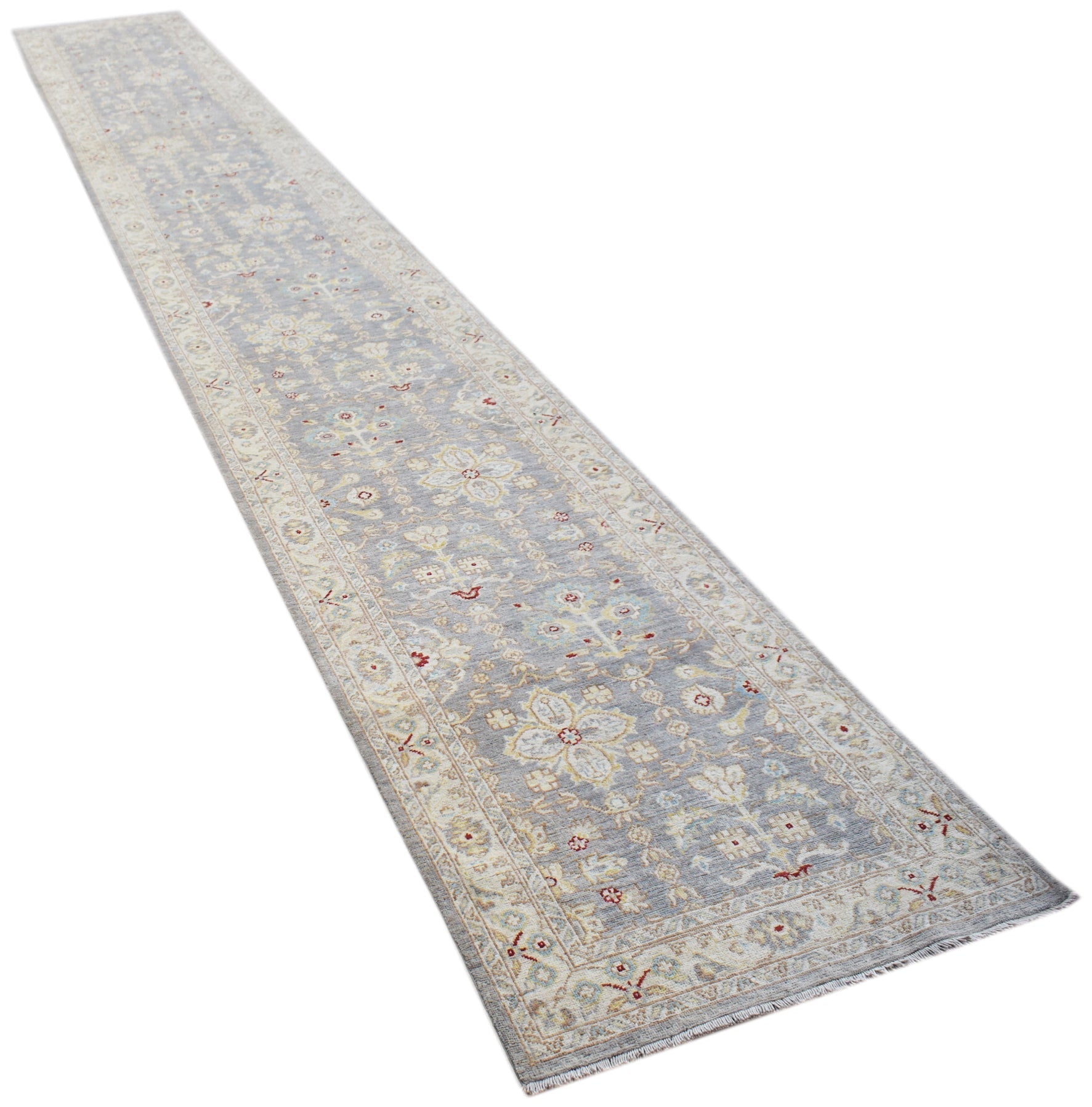 A long, handmade Afghan Chobi runner rug featuring a traditional floral pattern in soft grey tones.
