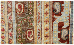 A handwoven Afghan Chobi runner featuring traditional paisley motifs in earthy tones.
