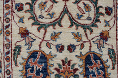 A handmade Afghan Chobi runner featuring intricate floral patterns in blue, red, and gold tones.