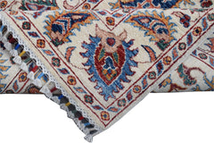 A handmade Afghan Chobi runner featuring a traditional Suzani pattern in vibrant wool colors.