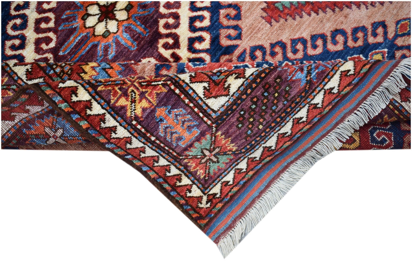 A handwoven Afghan Herati rug featuring intricate geometric patterns in vibrant wool colors.