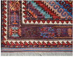A handwoven Afghan Herati rug featuring intricate geometric patterns in vibrant wool colors.