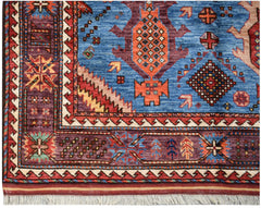 Handwoven Afghan Herati rug featuring a blue field with geometric patterns and a purple border.