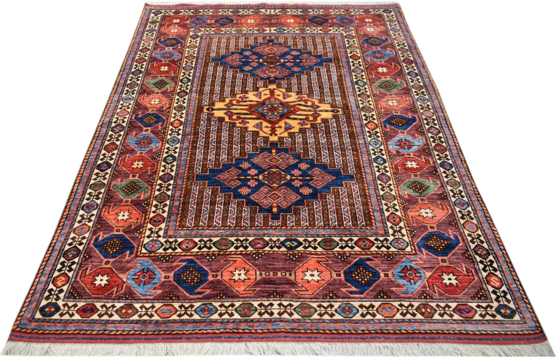 An Afghan Herati rug featuring a traditional geometric pattern in shades of blue, red, and gold.
