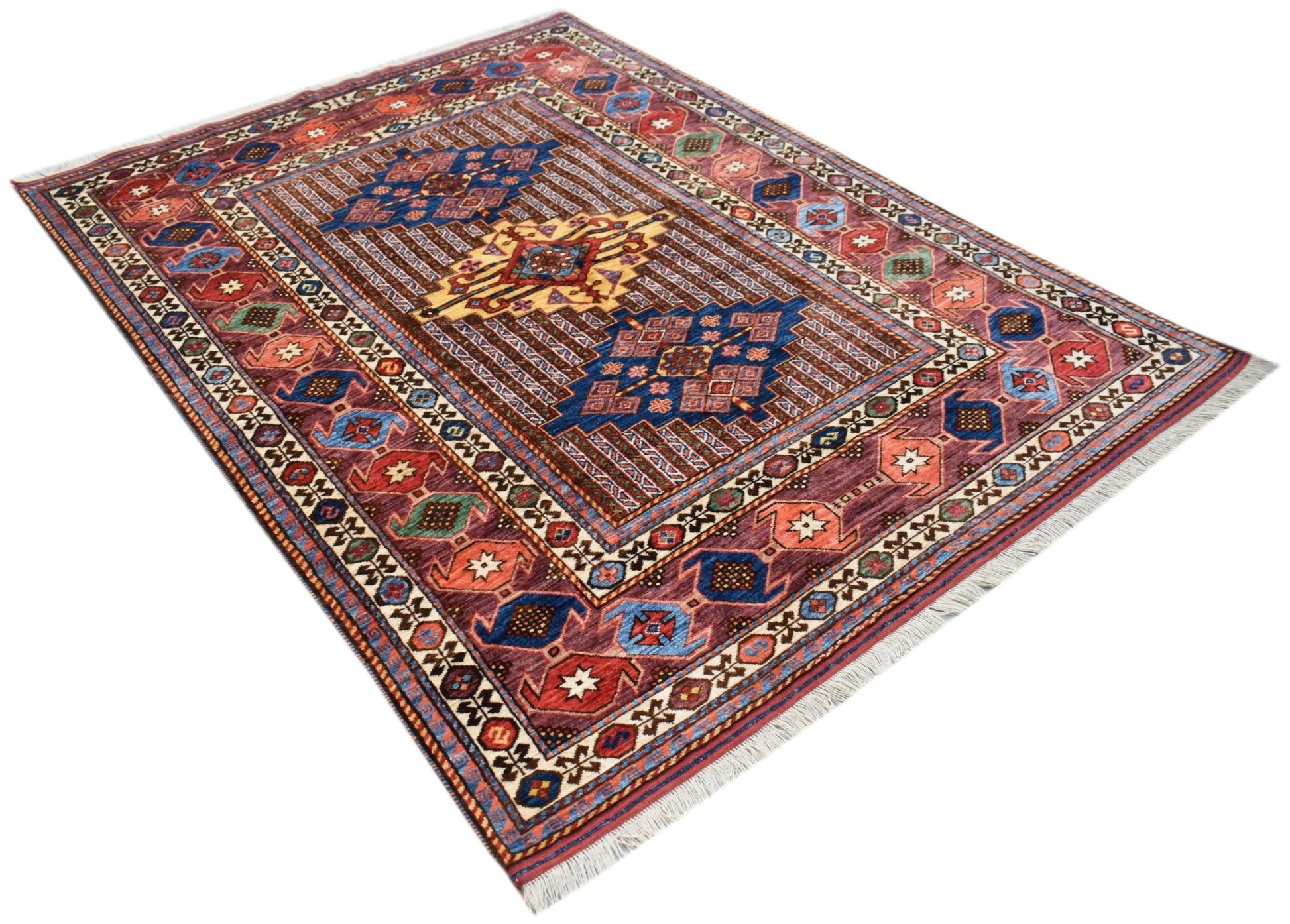 Handwoven Afghan Herati rug featuring a traditional geometric pattern in red, blue, and gold tones.
