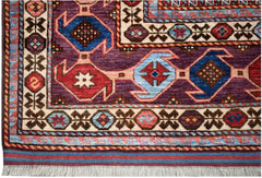 A handmade Afghan Herati rug featuring geometric patterns in purple, red, and blue wool.