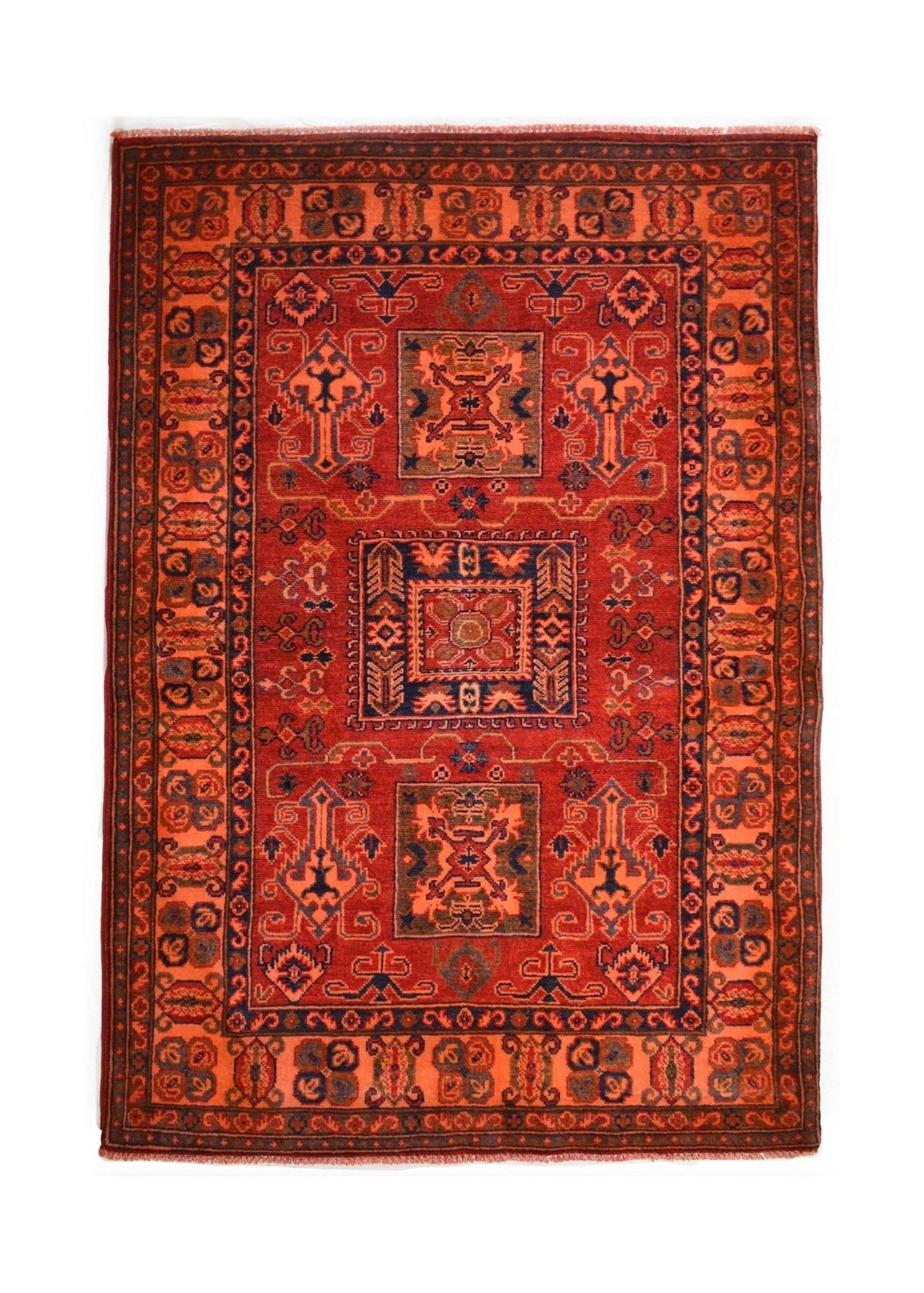 Handmade Afghan Kazakh rug featuring a geometric pattern in shades of red, orange, and blue.