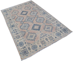 A handmade Afghan Kazakh rug featuring traditional blue geometric patterns on a light beige field.