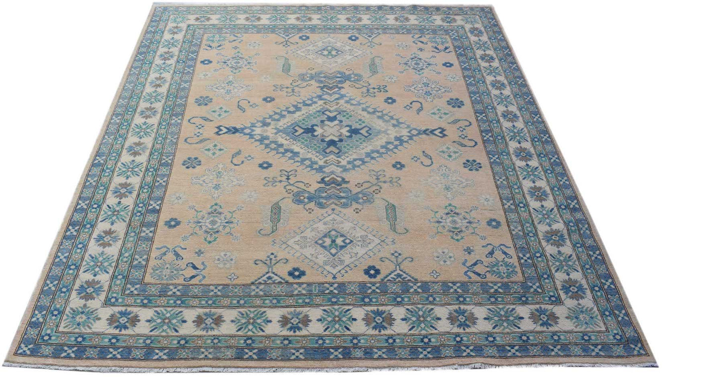 A handmade Afghan Kazakh rug featuring a beige field with blue and grey geometric patterns.