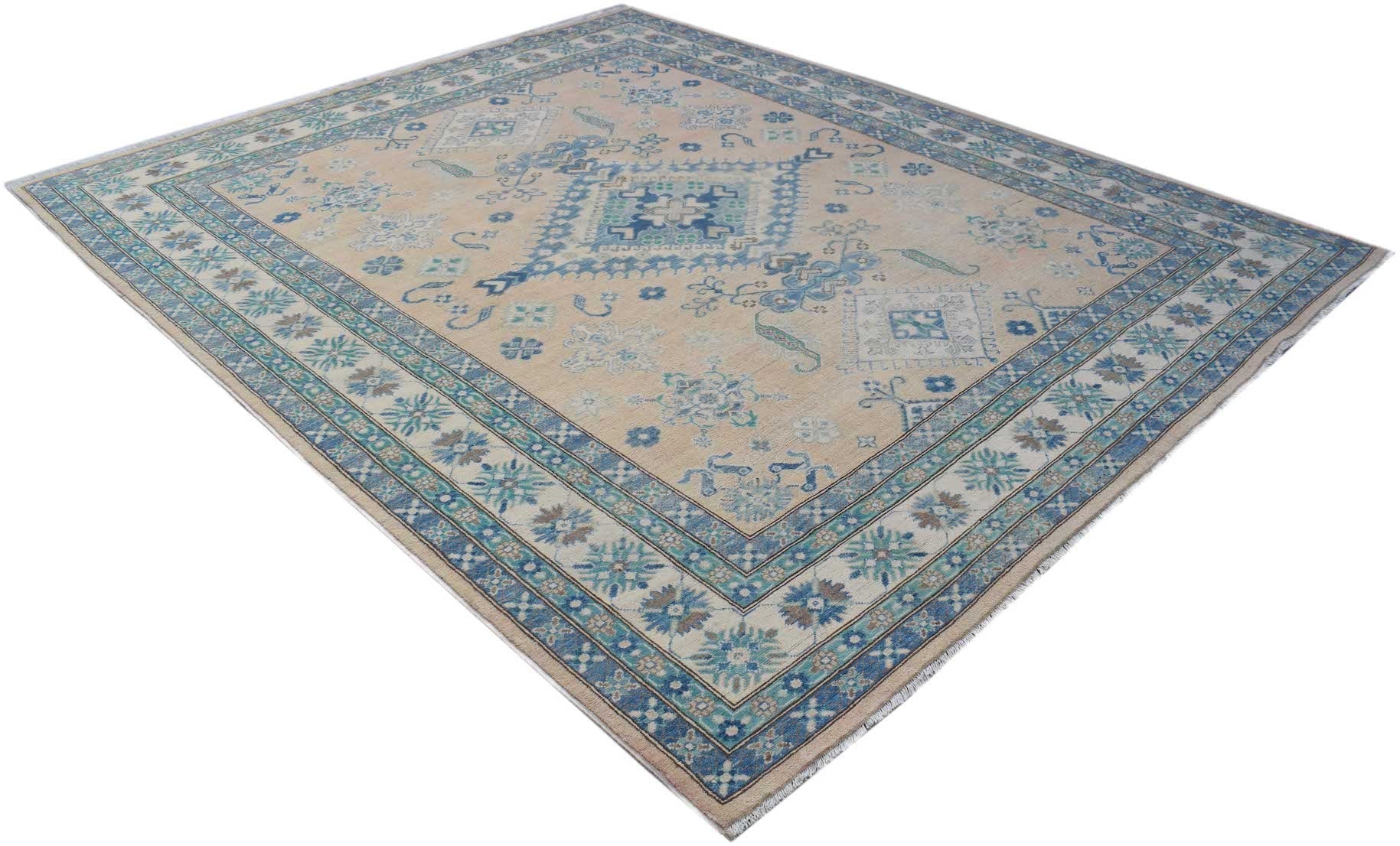 A handmade Afghan Kazakh rug featuring a beige field with blue and grey geometric floral patterns.