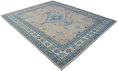 A handmade Afghan Kazakh rug featuring a beige field with blue and grey geometric floral patterns.