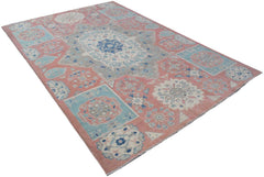 Handmade Afghan Kazakh rug featuring a geometric floral pattern in shades of pink, blue, and grey.