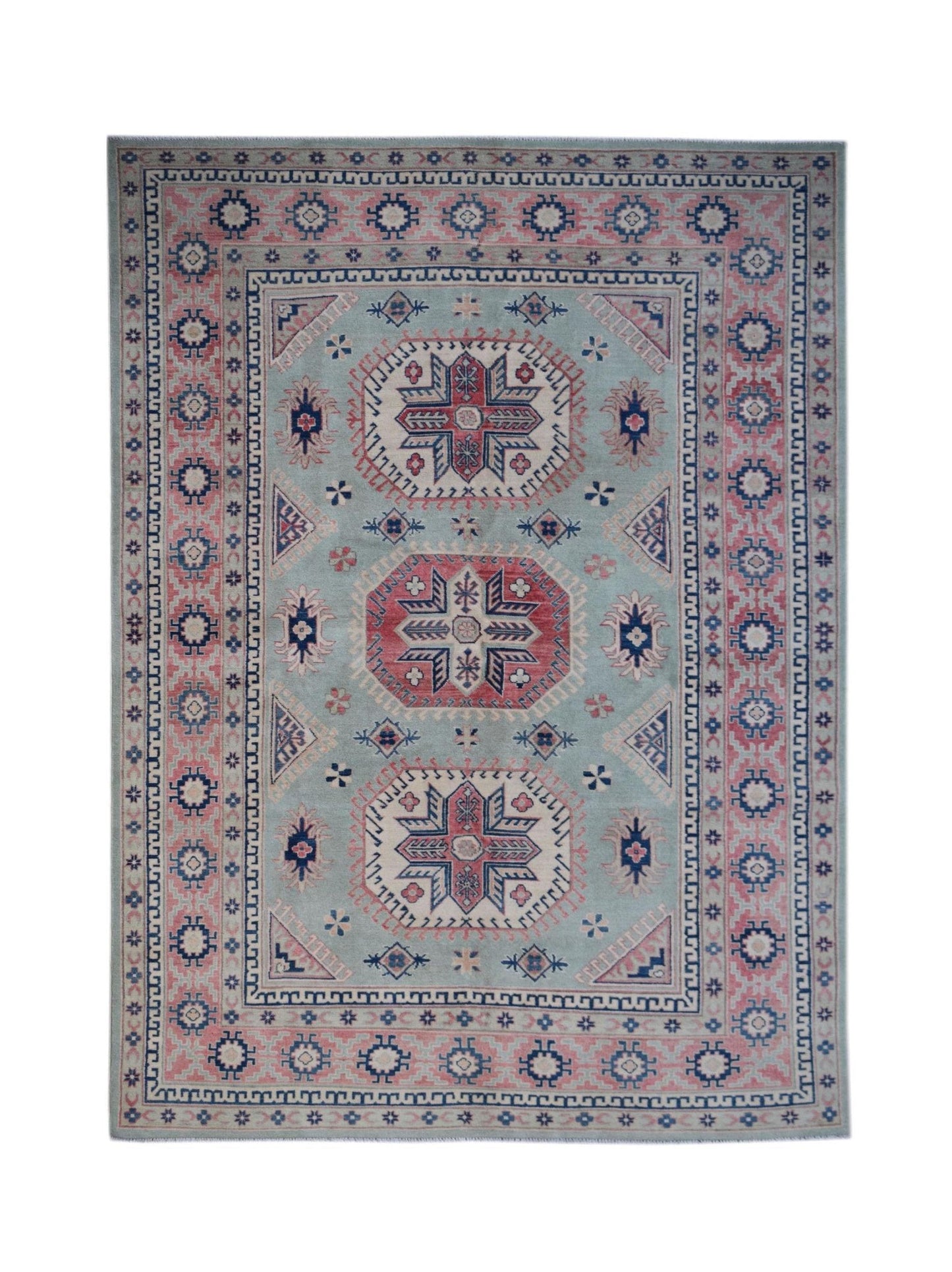 Handmade Afghan Kazakh rug featuring traditional geometric motifs in blue, red, and cream wool.