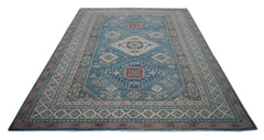 A handmade Afghan Kazakh rug featuring traditional geometric motifs in blue, red, and cream tones.