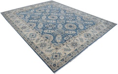Handmade Afghan Kazakh rug featuring a traditional blue and cream floral pattern.