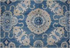 Handmade Afghan Kazakh rug featuring a traditional blue and cream floral medallion pattern.