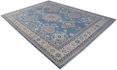 A handmade Afghan Kazakh rug featuring traditional geometric motifs in blue, cream, and pink tones.