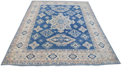 Handmade Afghan Kazakh rug featuring a traditional blue and beige geometric pattern.