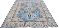 Handmade Afghan Kazakh rug featuring a geometric pattern in shades of blue and beige.