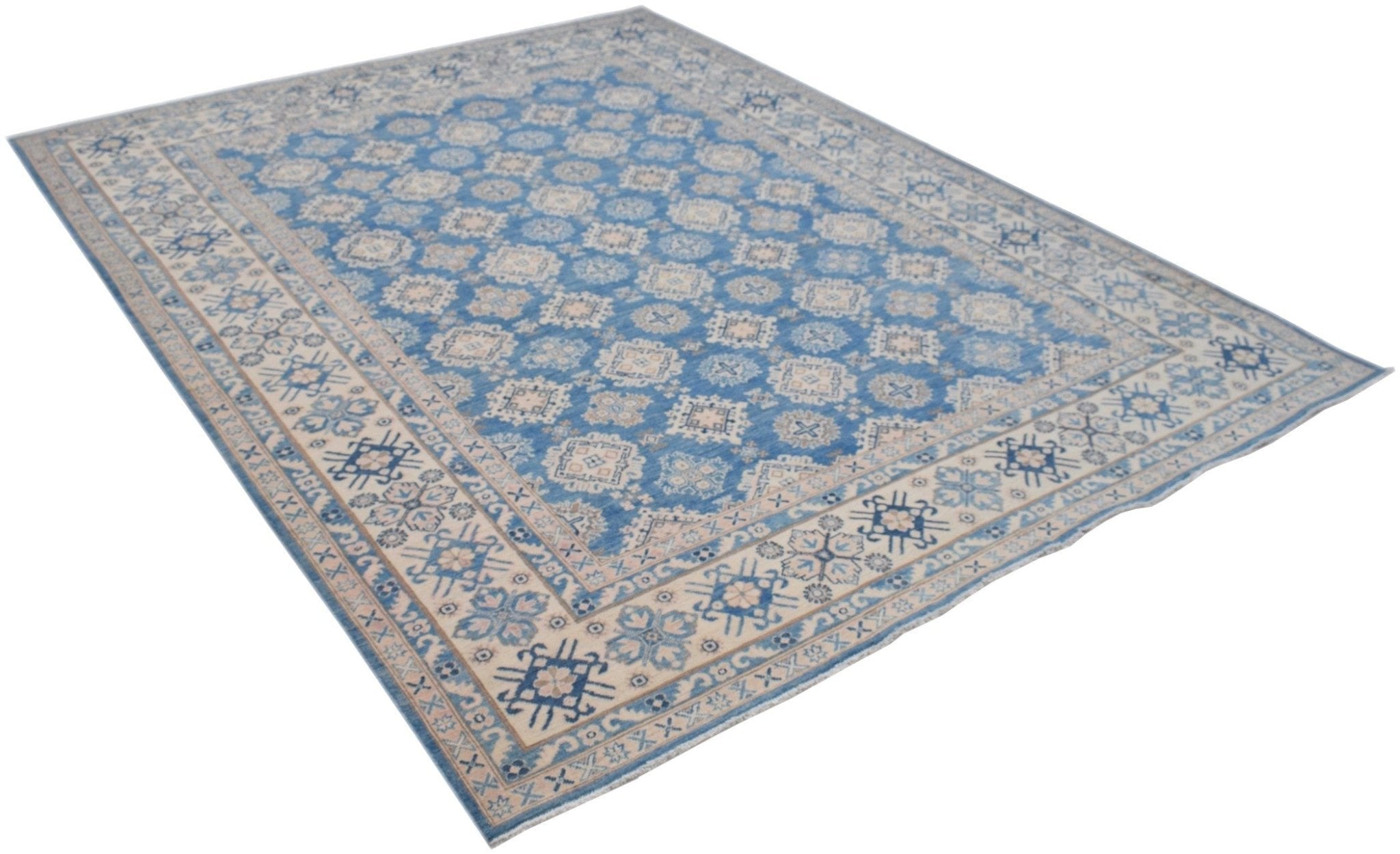 A handmade Afghan Kazakh rug featuring a repeating geometric pattern in shades of blue and beige.