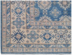 Handmade Afghan Kazakh rug featuring a geometric floral pattern in shades of blue and beige.