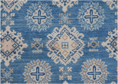 Handmade Afghan Kazakh rug featuring a geometric pattern in shades of blue, beige, and grey.