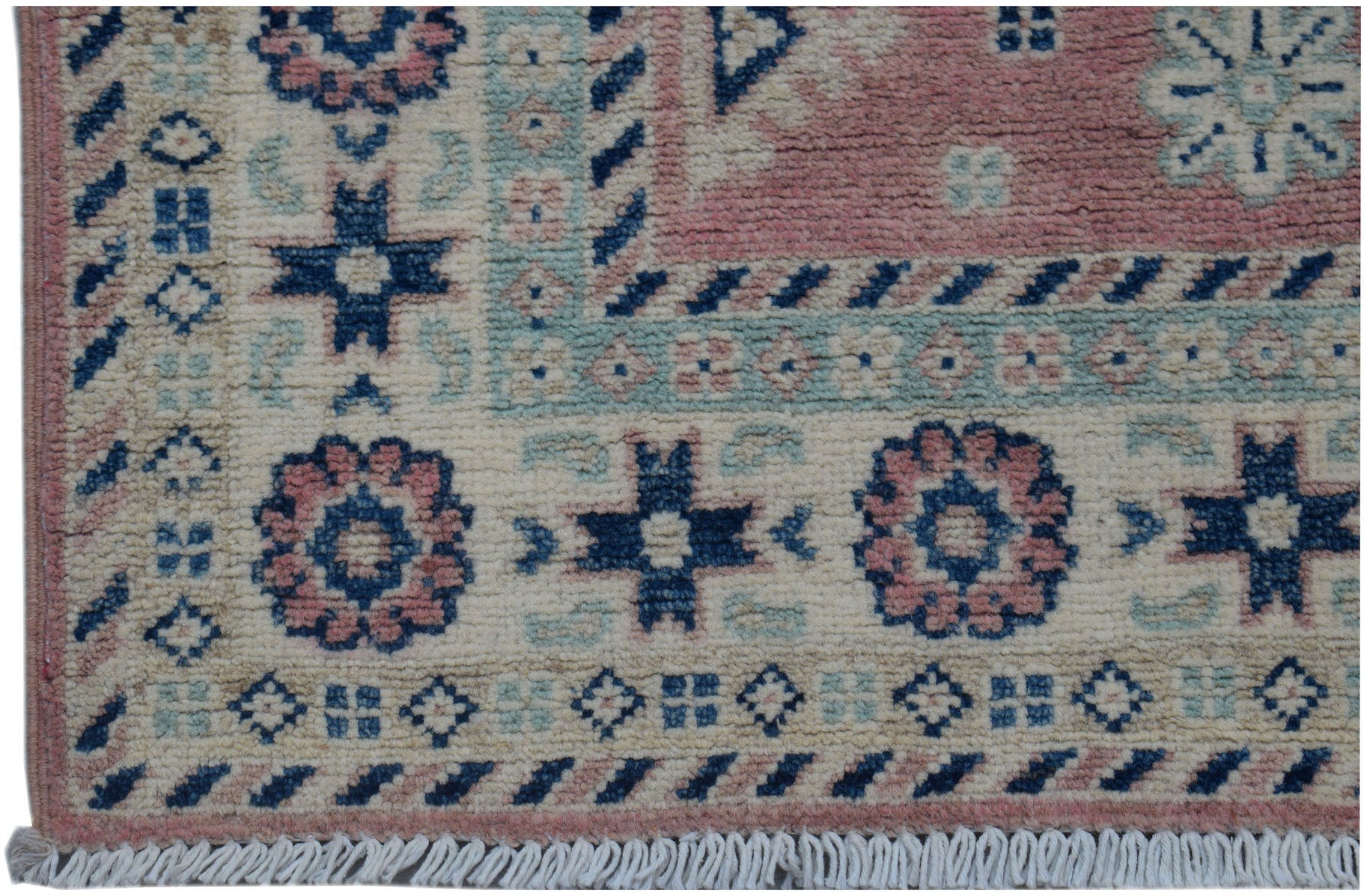 Handmade Afghan Kazakh runner featuring traditional geometric motifs in pink, blue, and cream.