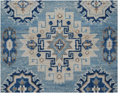 Handmade Afghan Kazakh runner rug featuring a geometric pattern in shades of blue, beige, and grey.