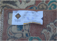 A handmade Afghan Kazakh runner featuring traditional motifs in wool on a cotton base.