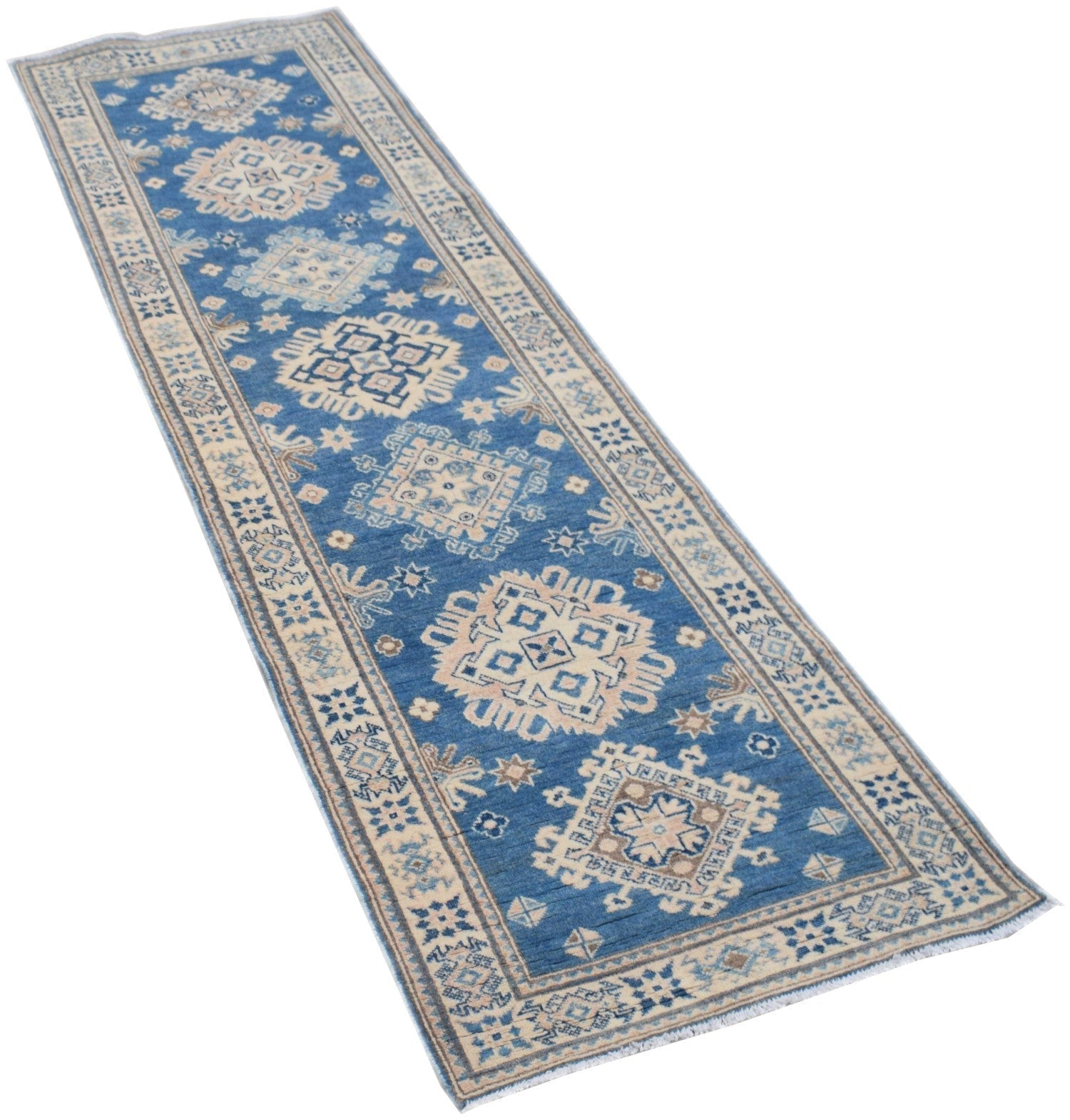 A handmade Afghan Kazakh runner rug featuring geometric patterns in blue and beige tones.