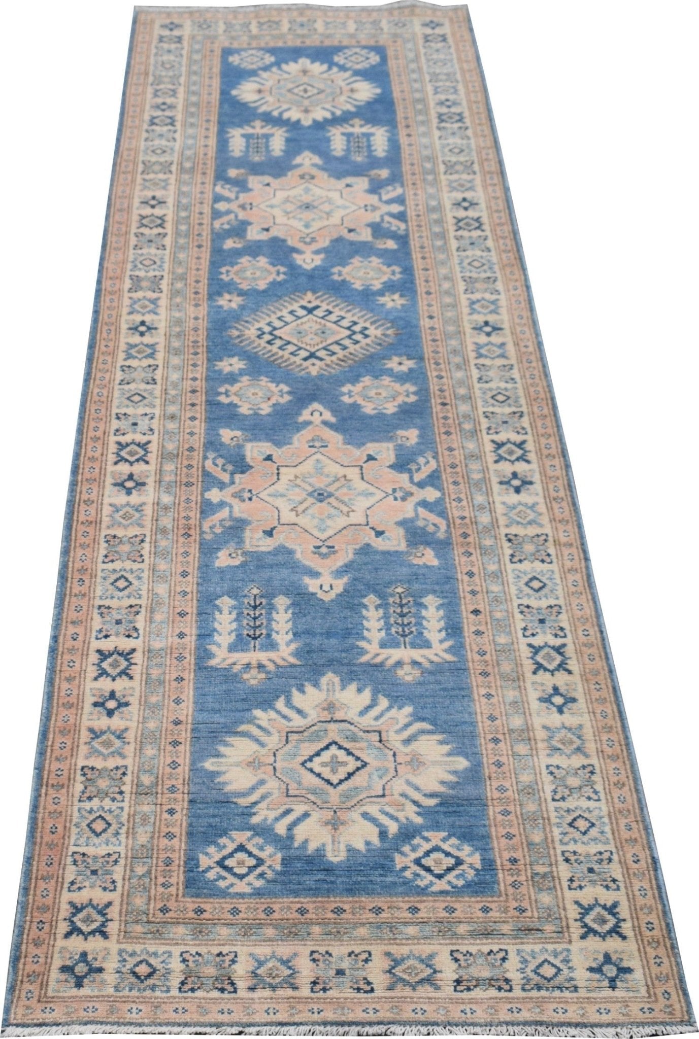 Handmade Afghan Kazakh runner rug featuring geometric medallions in blue, beige, and grey tones.