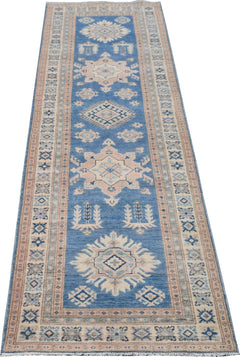 Handmade Afghan Kazakh runner rug featuring geometric medallions in blue, beige, and grey tones.