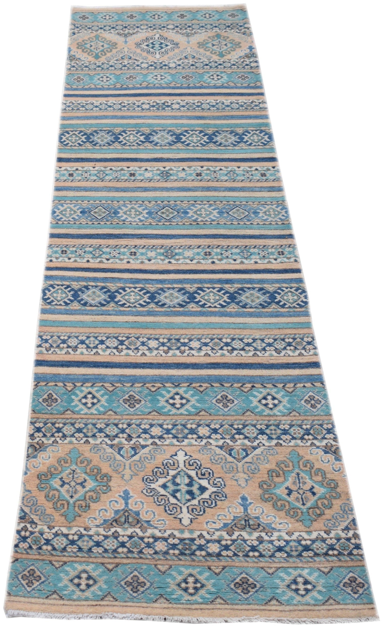 A handmade Afghan Kazakh runner rug featuring geometric patterns in shades of blue and beige.