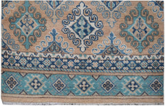 Handmade Afghan Kazakh runner rug featuring geometric patterns in beige and shades of blue.